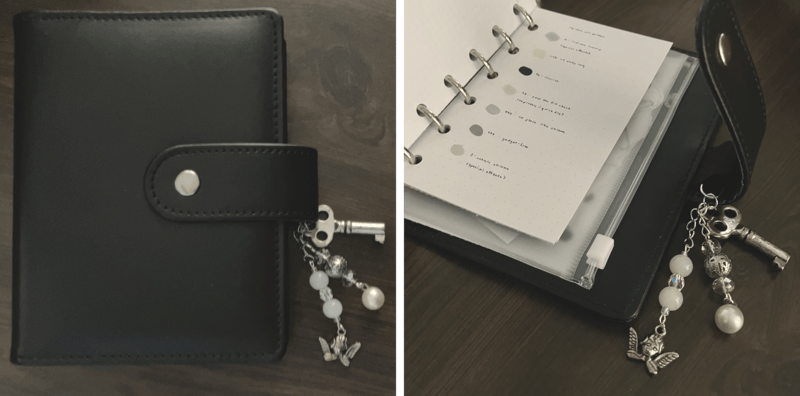 two square photos of a black pocket-sized 6-ring binder with metal charms on a wooden table.